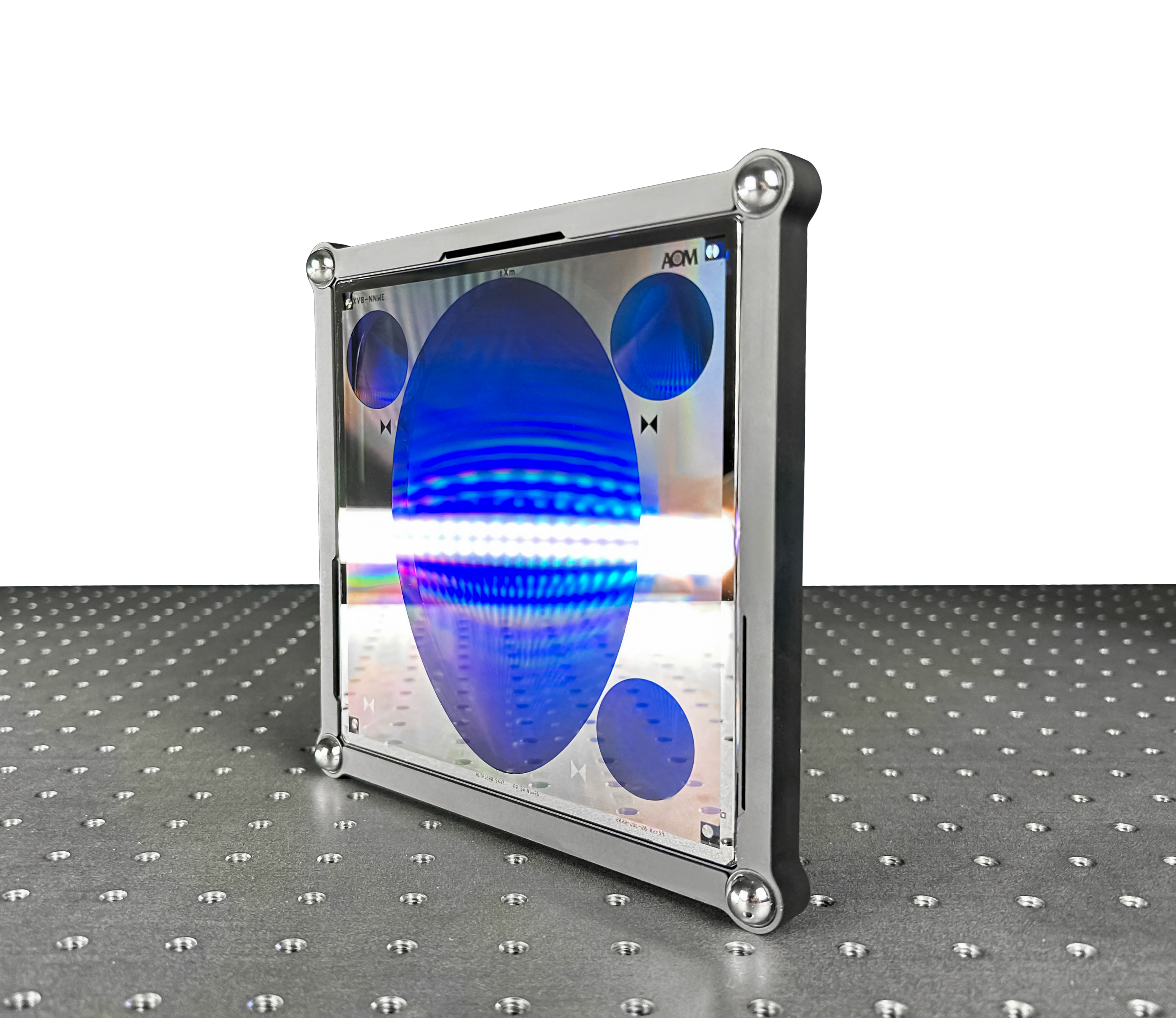 An AOM computer-generated hologram (CGH) with alignment patterns sits upright on an air table