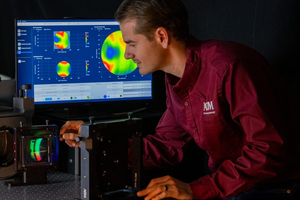 Dr. Logan Graves adjusts a measurement of a complex optic with the help of Morpheus CGH data software.